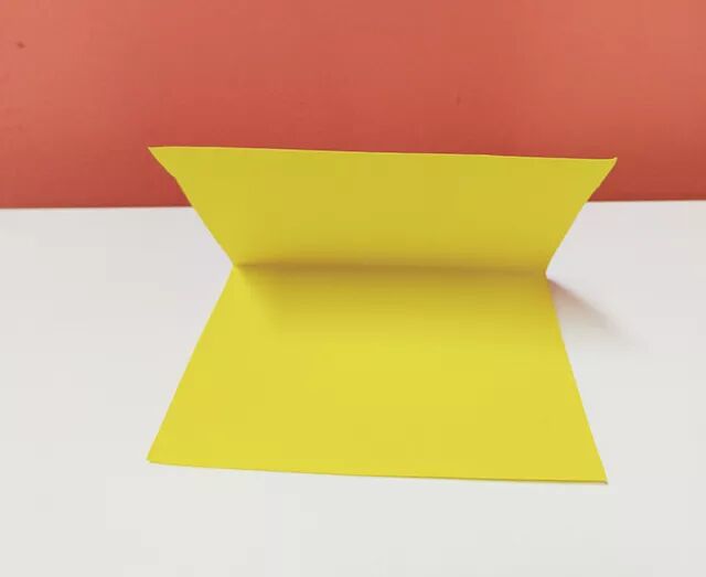 Fold paper in half