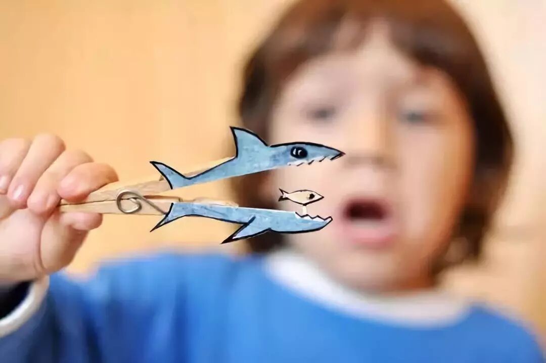 The hanger sticks to both sides of the shark