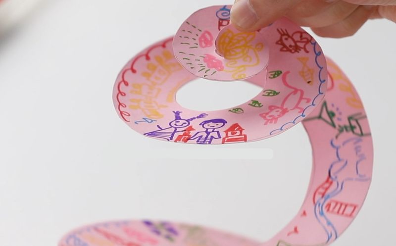 Attach a hanging string to the wind chime