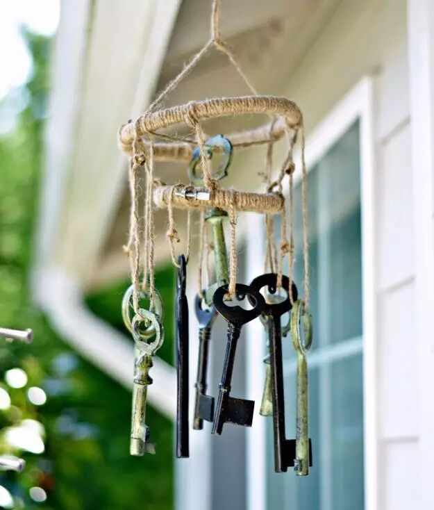 Thread the keys with thin string and tie them to the branch