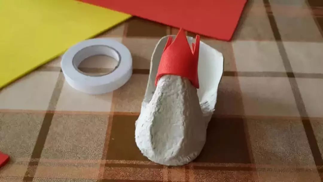 Cut out the chick's beak and other features from foam paper